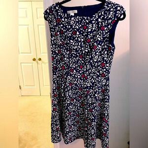 EUC London Times 8 knee length fit 2 flare dress. Raised dart details sleeveless